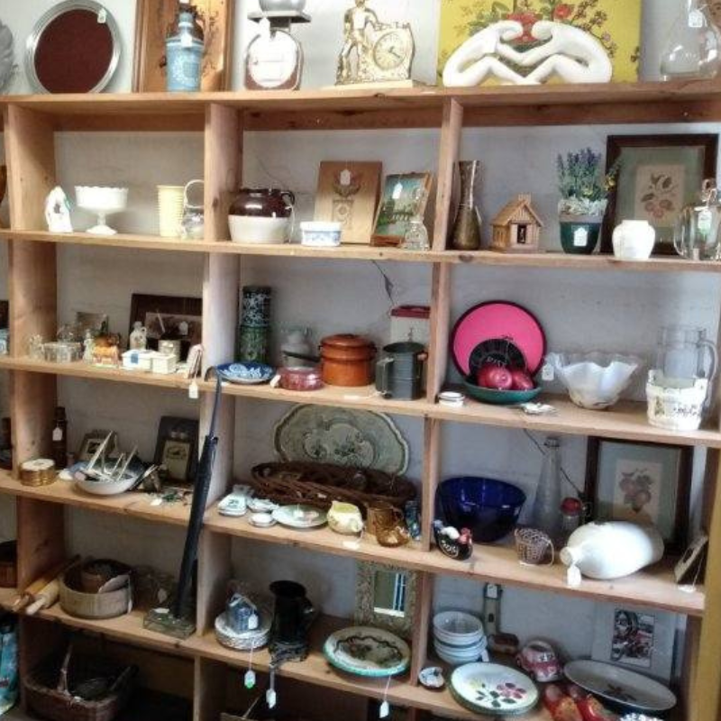 Shelves of vintage items and antiques at Liberty Tool Company in Maine